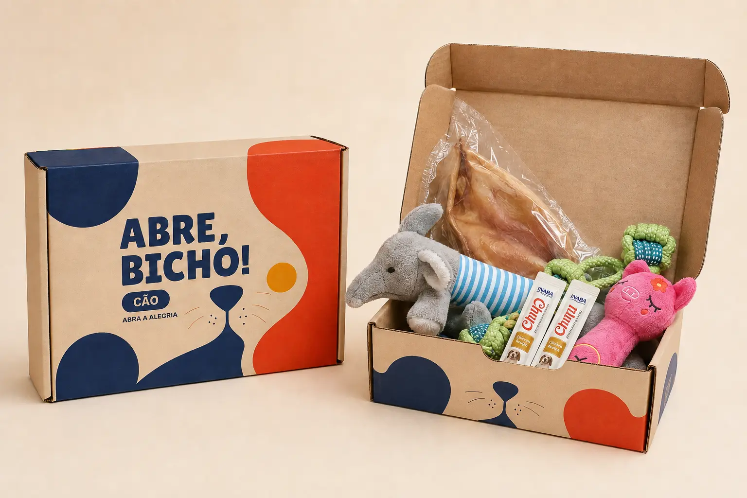 Caixa Abre, Bicho! para cães aberta com brinquedos e petiscos